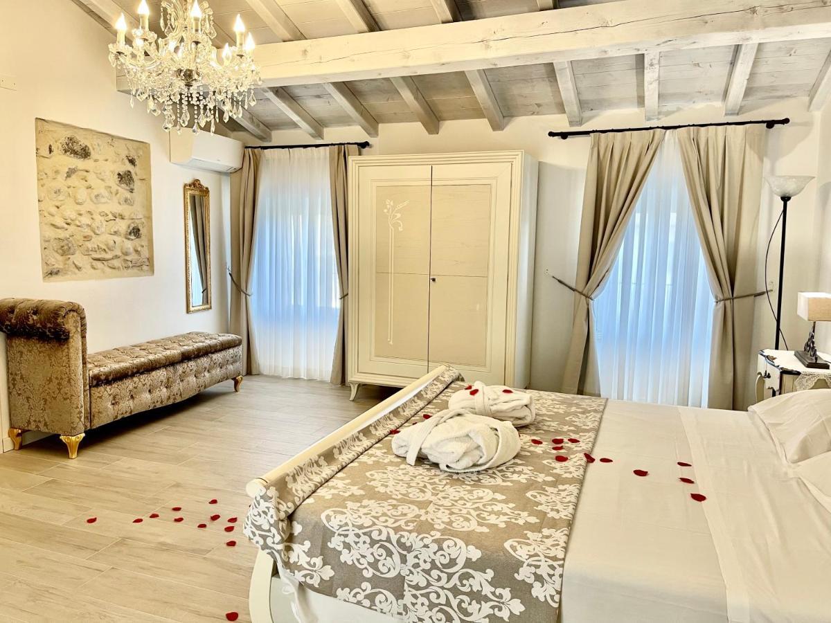 Dimora Di Charme Rooms & Apartments 佩斯基耶拉德加达 外观 照片